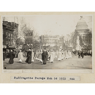 vintage photo fo a suffragette parade, dated March 3, 1913