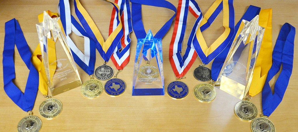 Awards arrayed on a table