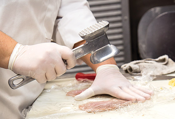 Pounding out the veal