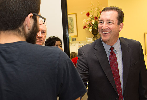 Dr. Goben greets people with a hearty handshake and a smile