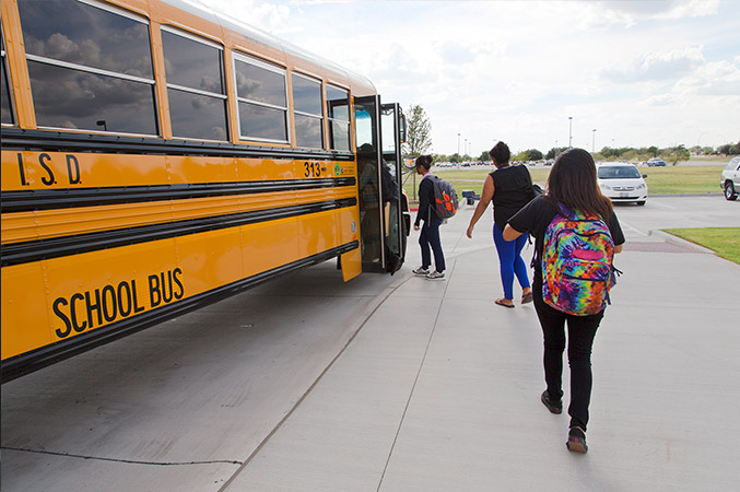 Crystal boards the school bus