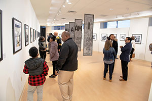 Visitors to an exhibit in the East Fork Gallery