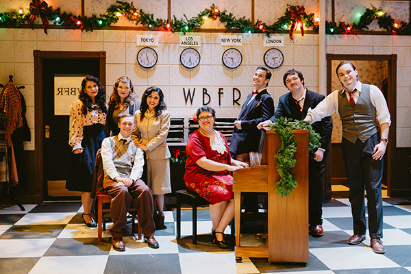 Casts from Northeast Theater taking pictures from one of their plays