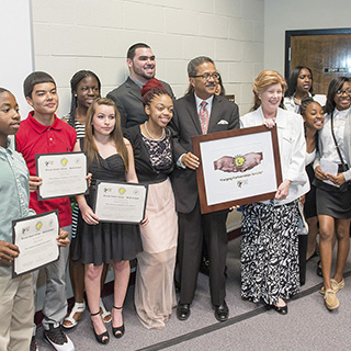 Students posing with their STEM awards