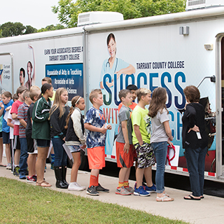Students lining up for the Mobile GO center