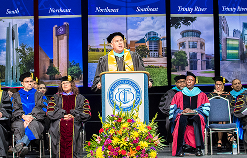 Chancellor Giovannini speaking at the graduation podium