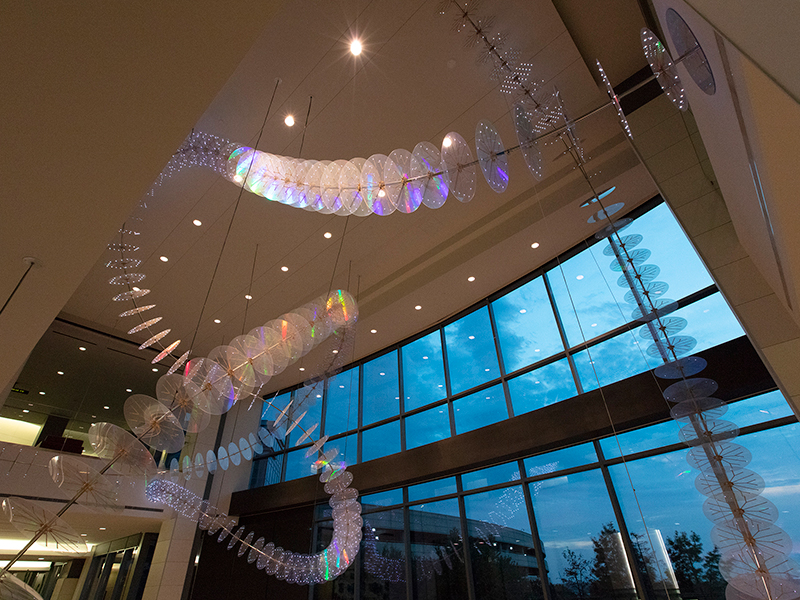Art installation of disks and lights