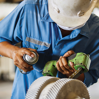 Man inspecting machine