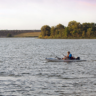 People kayaking on the river