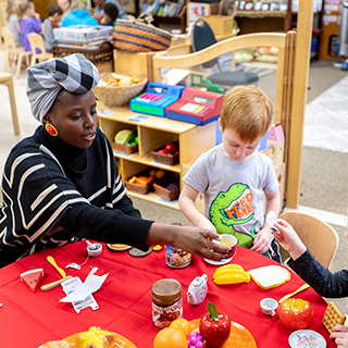 Teacher working with a young student