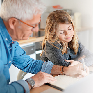 man helping student with  homework