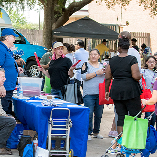 community members at an outdoor event