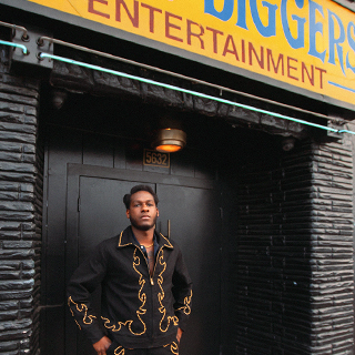 Leon standing outside a performance location